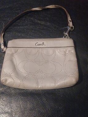 Coach Beige Perforated Leather Wristlet